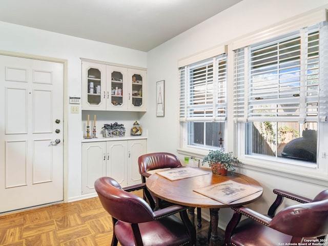 dining area with light parquet floors