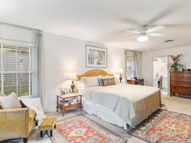 bedroom featuring ceiling fan and carpet flooring