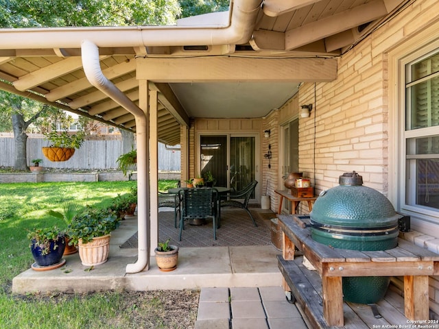 view of patio with a grill