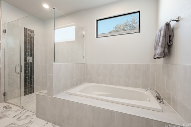 bathroom with independent shower and bath