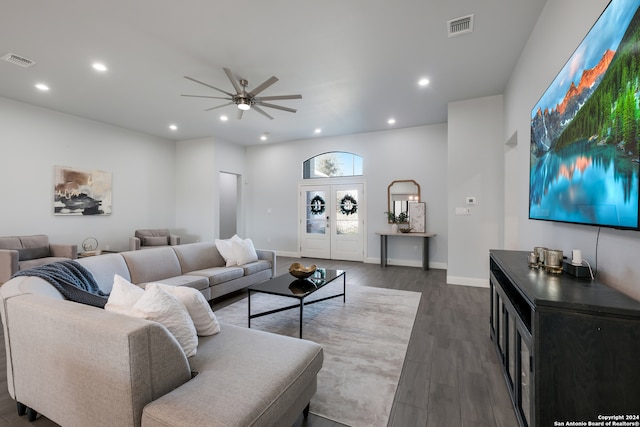 living room featuring french doors, dark hardwood / wood-style floors, and ceiling fan