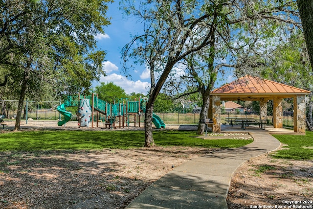 view of jungle gym featuring a gazebo and a yard