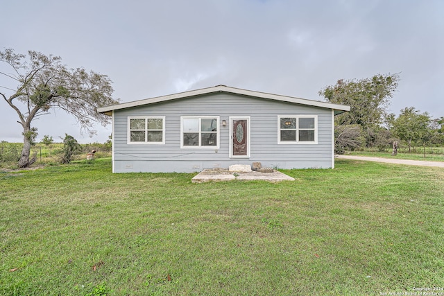 view of front of house with a front lawn