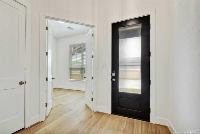 entrance foyer with light hardwood / wood-style floors