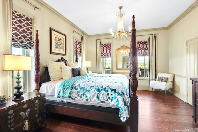 bedroom with a notable chandelier, dark hardwood / wood-style floors, and ornamental molding