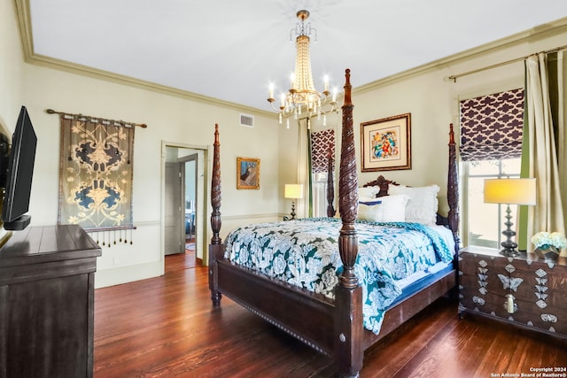 bedroom featuring ornamental molding, a chandelier, and dark wood-type flooring