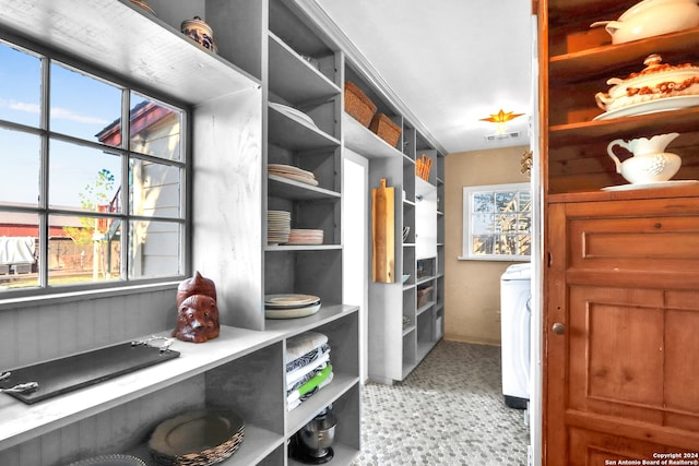 pantry featuring washer / dryer