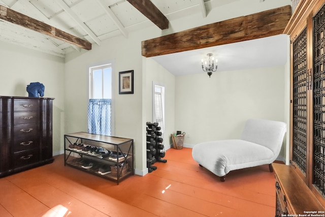 living area featuring hardwood / wood-style flooring, lofted ceiling with beams, and a notable chandelier