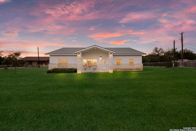 exterior space featuring a lawn