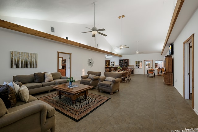 living room featuring high vaulted ceiling, tile patterned floors, and ceiling fan