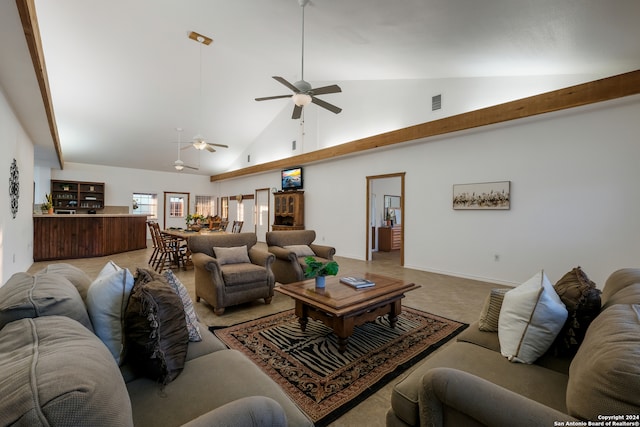 living room featuring light carpet, high vaulted ceiling, and ceiling fan