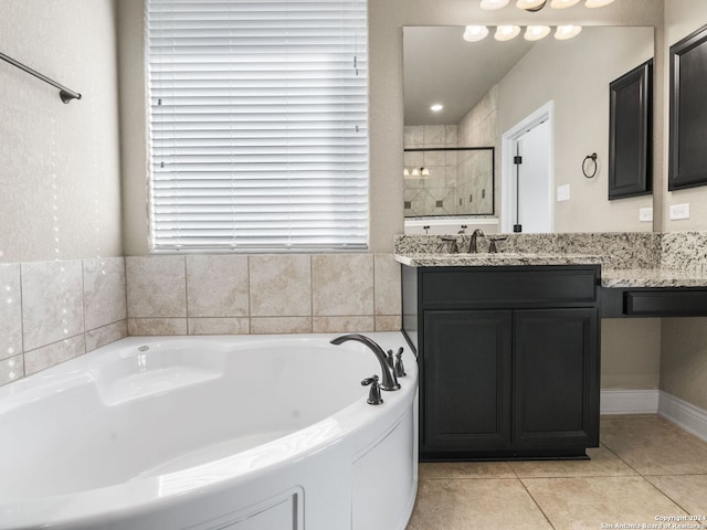 bathroom with vanity, separate shower and tub, and tile patterned flooring