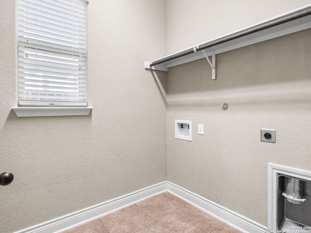 laundry area featuring washer hookup, hookup for a gas dryer, electric dryer hookup, and tile patterned floors