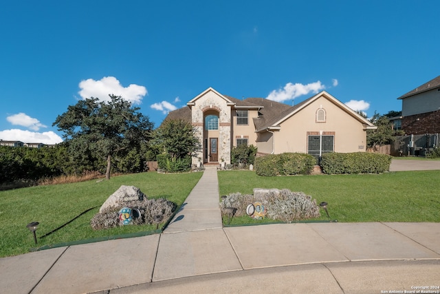 view of front facade with a front lawn