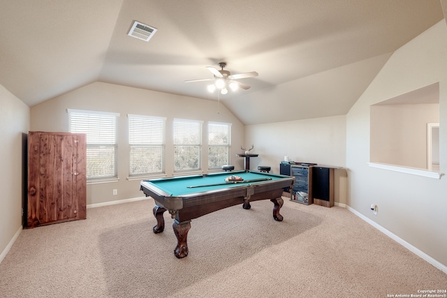 recreation room featuring carpet, vaulted ceiling, and a wealth of natural light