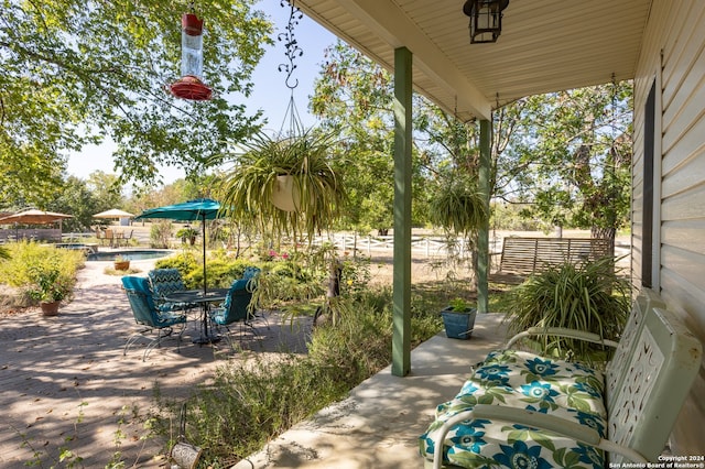 view of patio featuring a jacuzzi