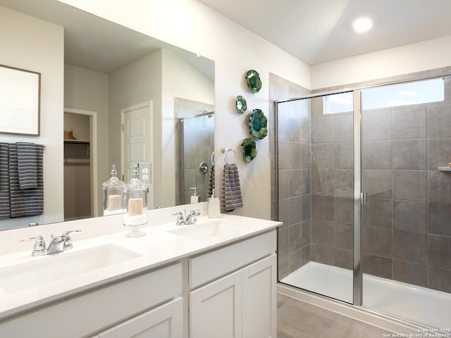 bathroom with walk in shower, lofted ceiling, and vanity