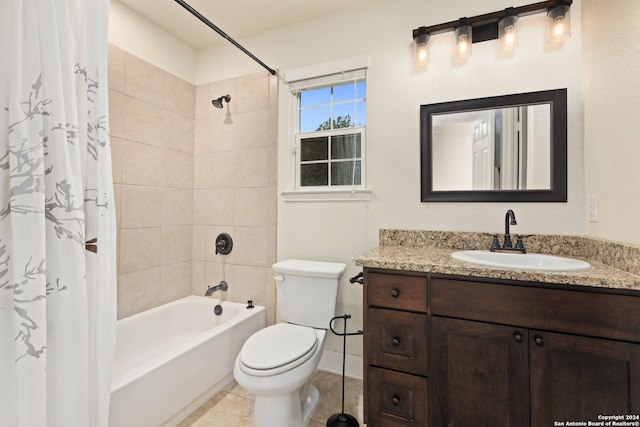 full bathroom featuring vanity, shower / tub combo, toilet, and tile patterned floors