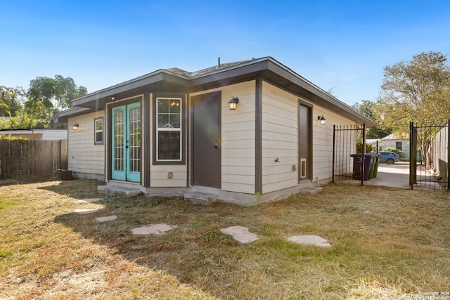 view of outdoor structure with a lawn