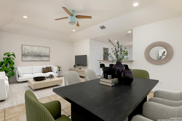 dining area featuring light tile patterned floors and ceiling fan