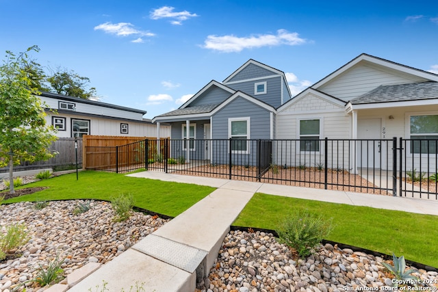 view of front of home with a front lawn