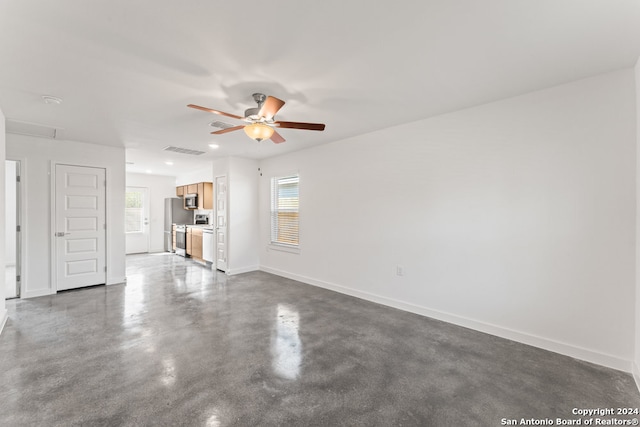 spare room with ceiling fan