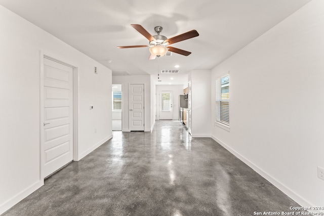 interior space featuring ceiling fan