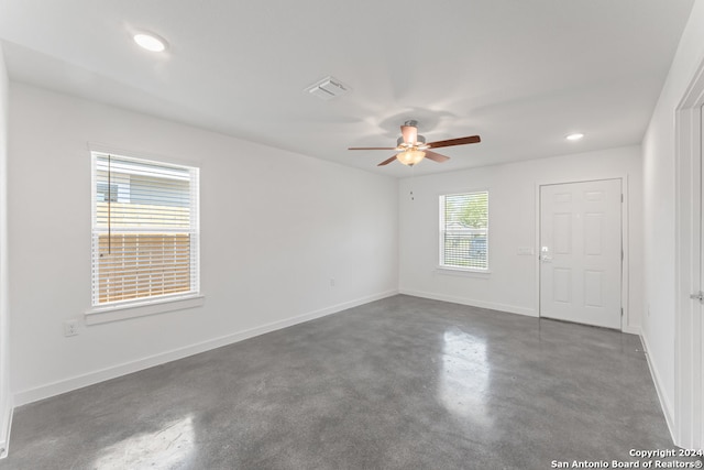 unfurnished room with ceiling fan