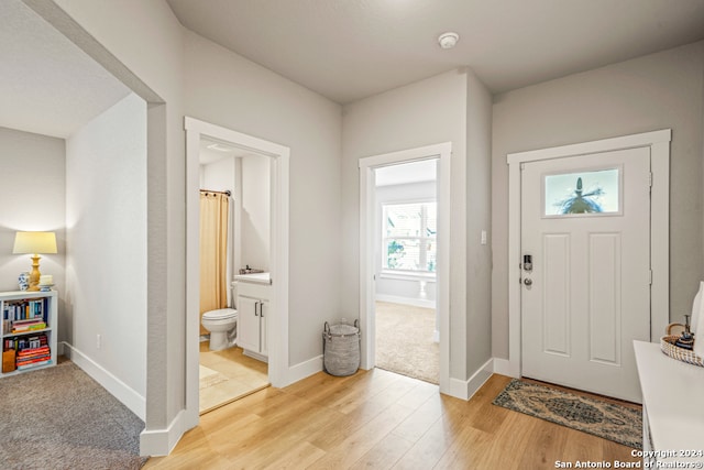 foyer entrance featuring light hardwood / wood-style floors