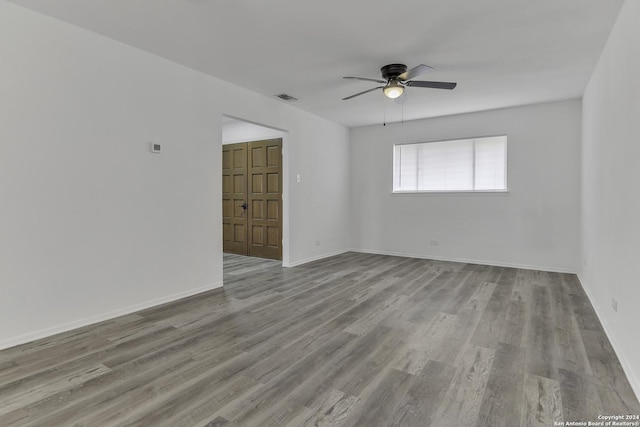 4207 High Sierra, San Antonio, TX 78228 - unfurnished room featuring ceiling fan, wood finished floors, and baseboards
