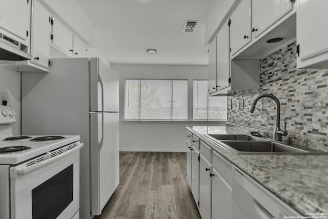 4207 High Sierra, San Antonio, TX 78228 - kitchen featuring white appliances, a sink, backsplash, under cabinet range hood, and dark wood finished floors