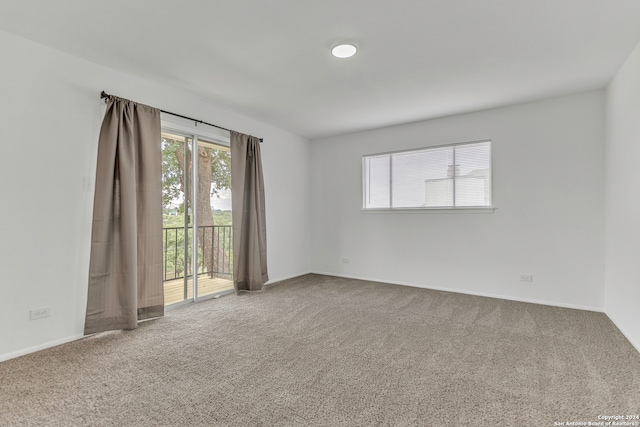 empty room featuring carpet flooring