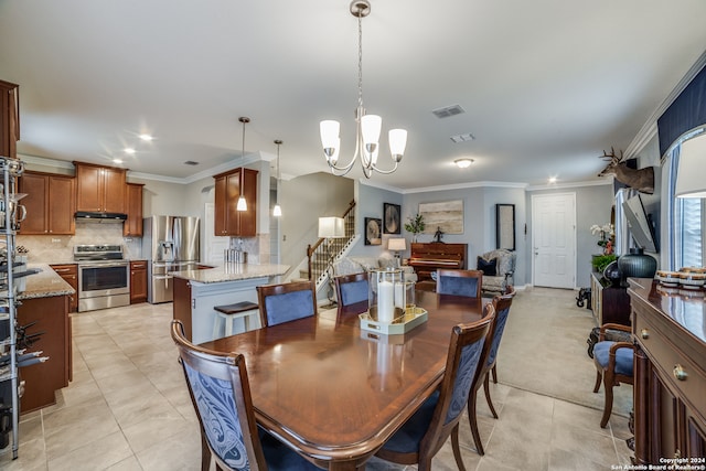 dining area featuring light tile patterned floors, ornamental molding, and a chandelier