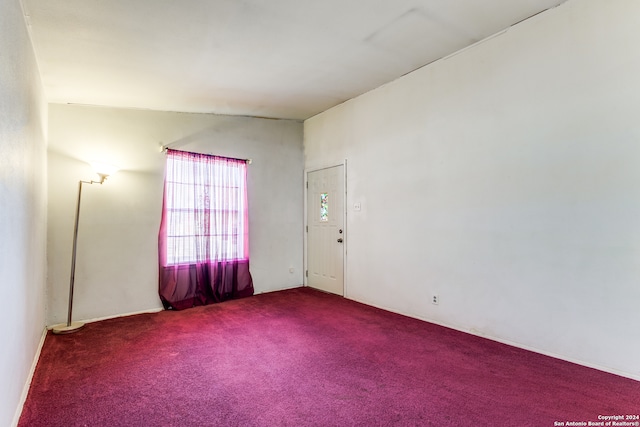 unfurnished room featuring carpet flooring