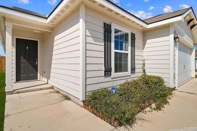 entrance to property with a garage