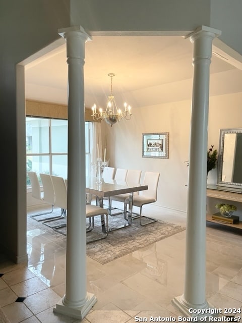 dining area with a chandelier