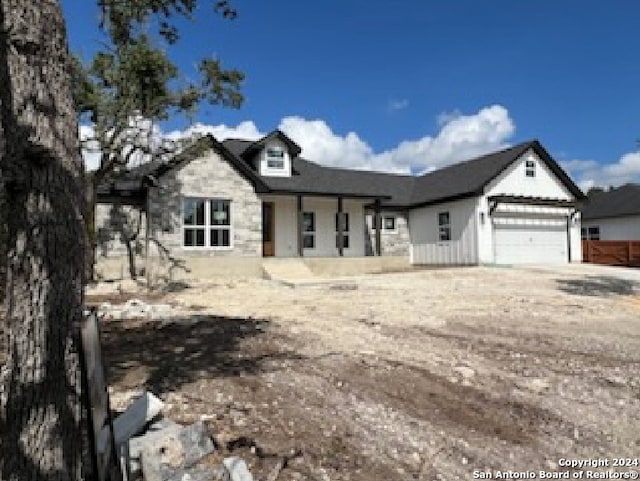 view of front of property with a garage