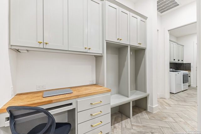 mudroom with built in desk