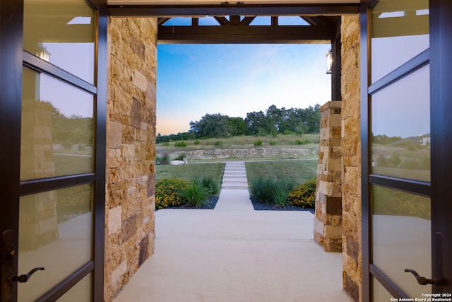 doorway to outside featuring a rural view