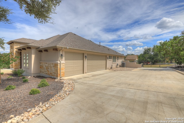 view of home's exterior with a garage