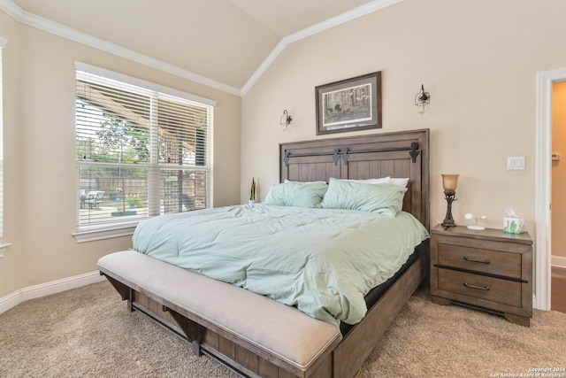 bedroom with ornamental molding, vaulted ceiling, and light colored carpet