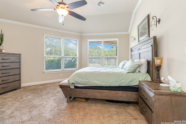 bedroom featuring multiple windows, light carpet, and ceiling fan