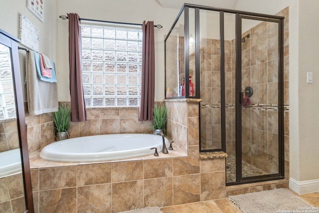 bathroom featuring plus walk in shower