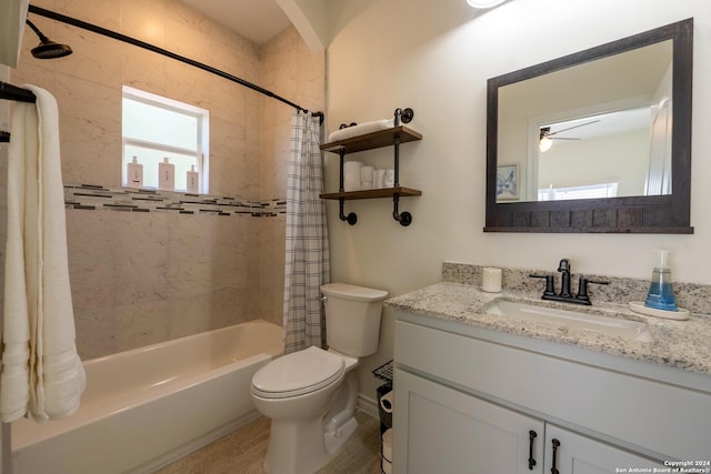 full bathroom with tile patterned flooring, shower / tub combo, ceiling fan, vanity, and toilet