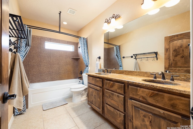 full bathroom featuring shower / tub combo, tile patterned flooring, toilet, and vanity