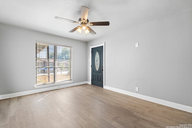 foyer featuring ceiling fan and hardwood / wood-style flooring