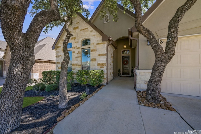 property entrance with a garage