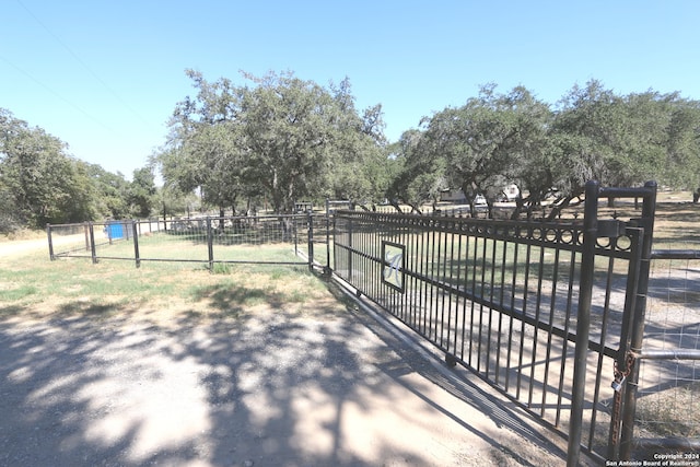 view of gate featuring a rural view