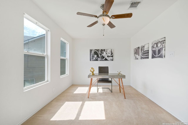 office area featuring ceiling fan and light colored carpet