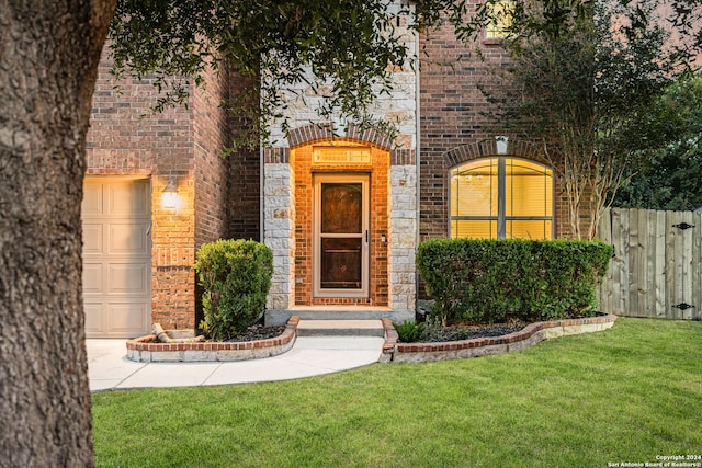 11806 Jasmine Way, San Antonio, TX 78253 - doorway to property featuring a lawn, brick siding, fence, and stone siding